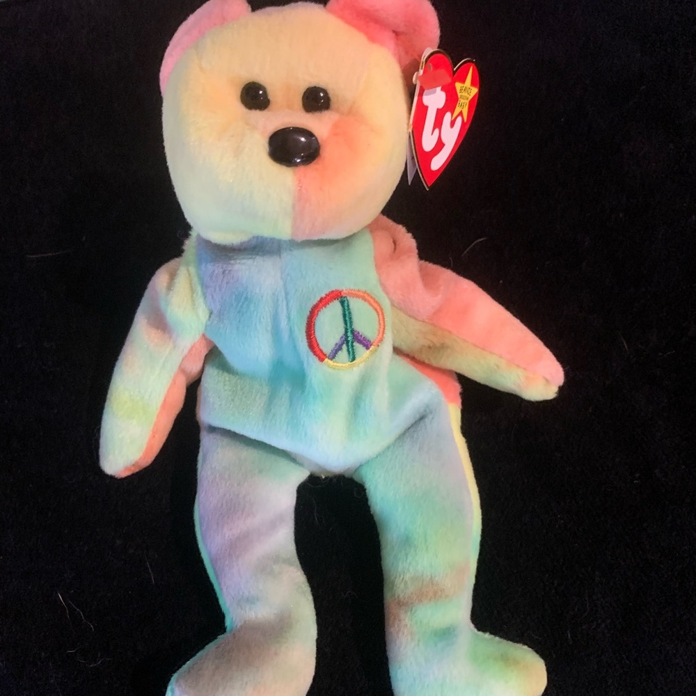 Peace bear beanie babie with many tag errors
